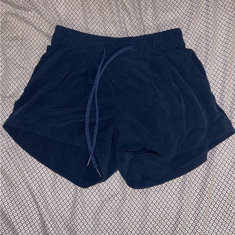 Navy blue lululemon shorts size 2. Good condition!